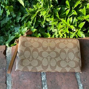 Coach wallet with double zippers for lots of storage